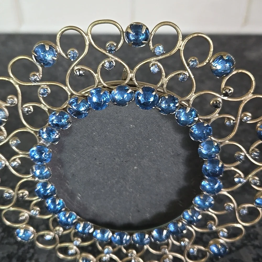 Gold Metal Round Frame Bedazzled with Blue Gem Stones